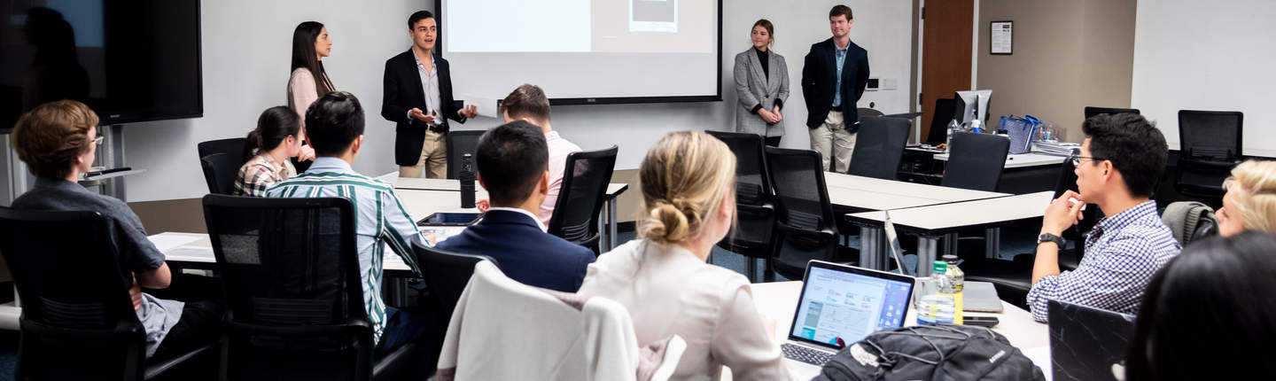 Students presenting in a Seaver classroom
