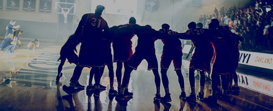 Pepperdine Waves basketball team rally